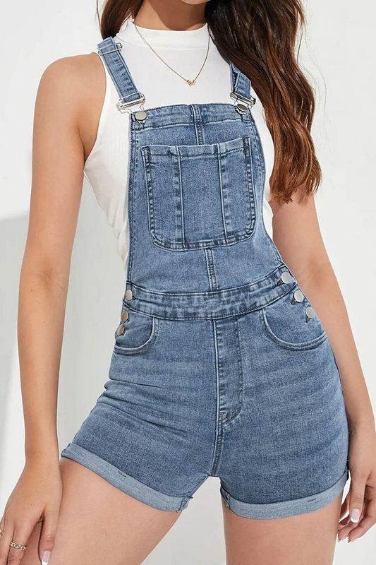 Stay cool and stylish this summer with these slim-fit denim shorts overalls. The lightweight fabric keeps you comfortable, while the knee-length cut and mid-rise waist flatter every body type. Perfect for casual outings or weekend adventures, these overalls are easy to dress up or down. Pair them with sandals for a laid-back look or add sneakers for active days. The adjustable straps ensure a perfect fit, and the pockets add function to fashion. A versatile piece you’ll reach for all season. 